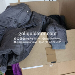 Pallets with jackets, coats and vests in wholesale liquidation.